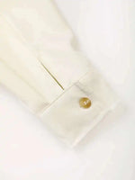 EAM Beige Zipper Pocket Back Bandage Blouse Women New Lapel Long Sleeve Loose Fit Shirt Fashion Spring Autumn 2025 1DF149100