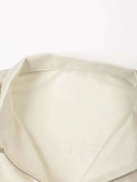 EAM Beige Zipper Pocket Back Bandage Blouse Women New Lapel Long Sleeve Loose Fit Shirt Fashion Spring Autumn 2025 1DF149100