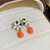 5 orange flower clip